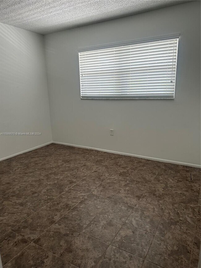 Building Photo - 8110 Sunrise Lakes Blvd