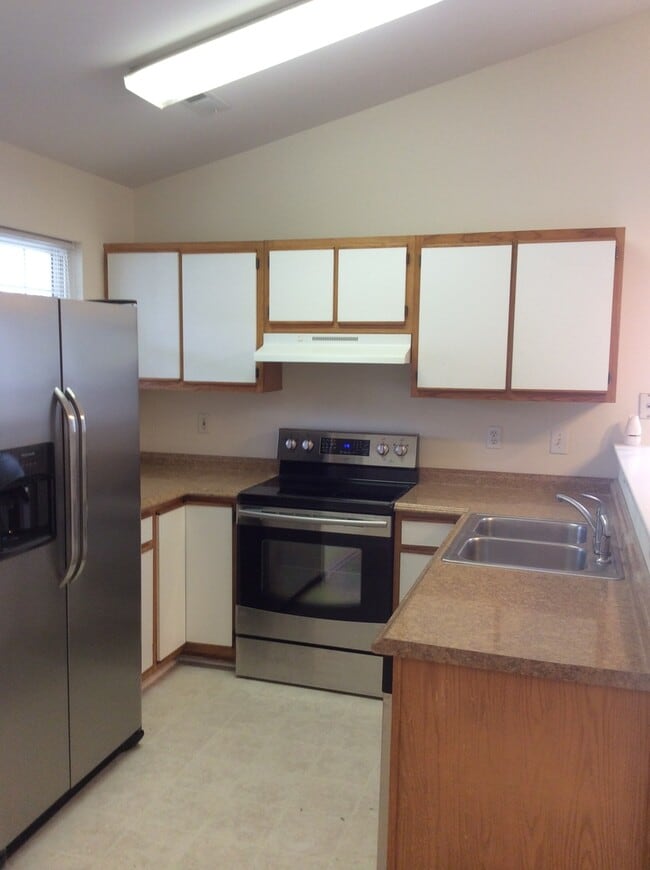 Photo - Updated flooring, McClelland Town homes 2BR/2Bath one level patio home, with back court yard! Clo...