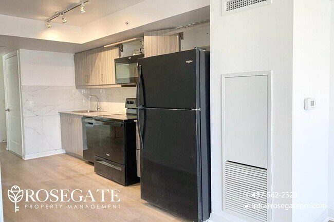 Building Photo - Modern 1+Den Condo with Parking & Locker |...