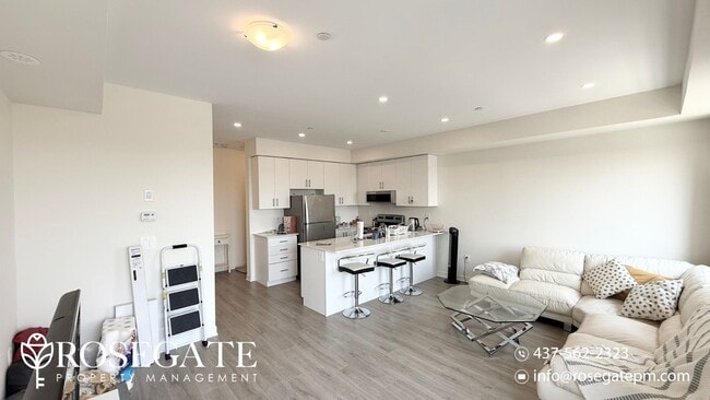 Building Photo - Brand New 1-Bedroom Condo with 2.5 Baths &...