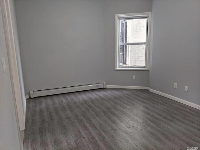 Building Photo - 50-64-64 44th St