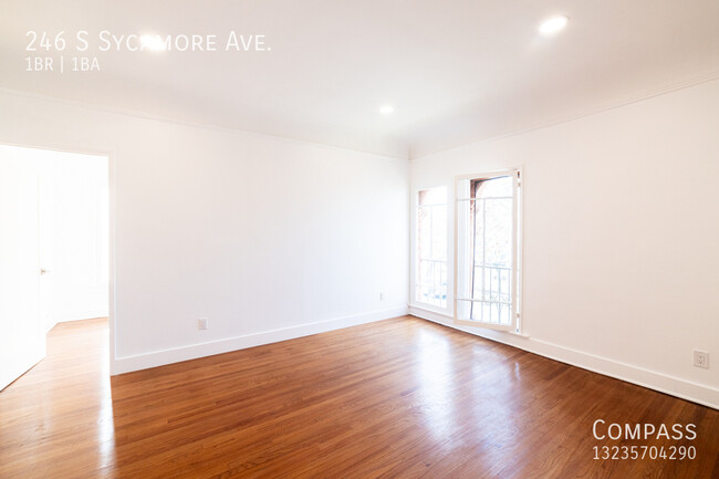 Building Photo - A Grand, Light-Filled 1-Bedroom with Bonus...