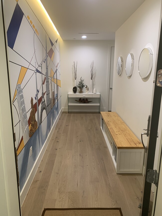 Custom art gallery in entryway with 18X10 full wall Mural - 3923 Cole Ave