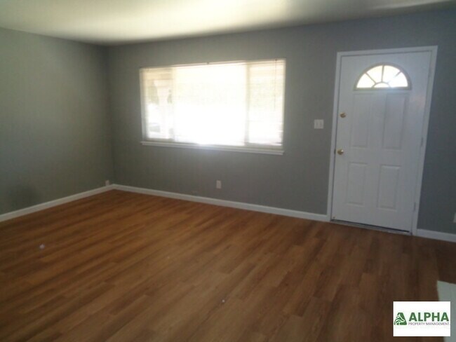 Building Photo - nice three bedroom one bath two car garage