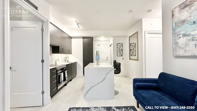 Photo du bâtiment - 36 Elm Dr W