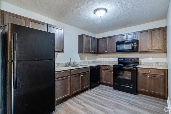 2BR, 1BA - 900SF - Kitchen - Topaz Oaks