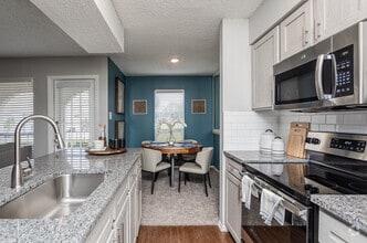 1BR, 1BA - 651SF Kitchen & Dining - Royal Palms