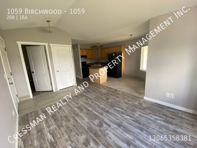 Building Photo - Upper level condo in South Regina