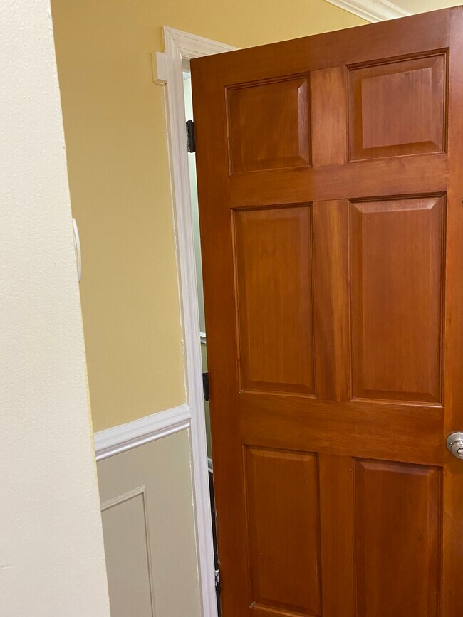 Solid wood entrance door into apartment - 2015 Lafayette Ave