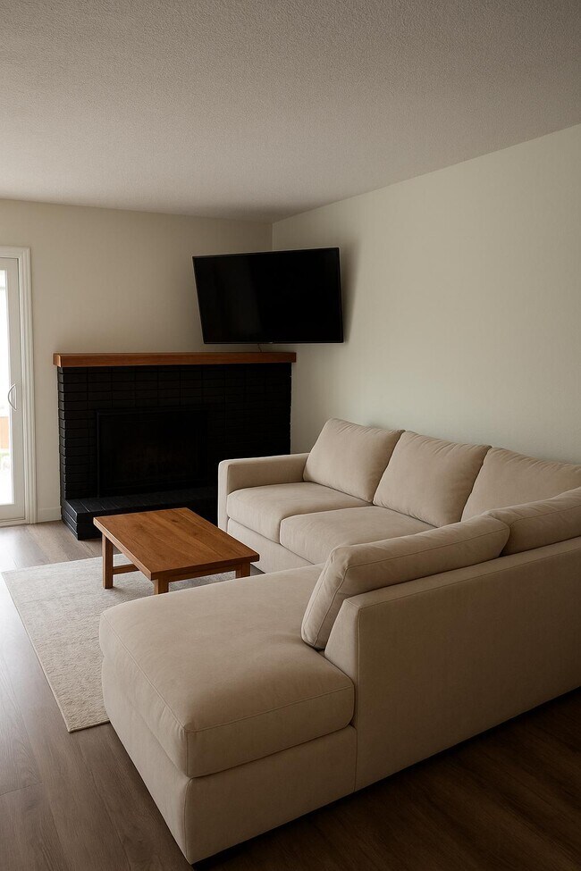 Salón con chimenea - 334 Calor Dr