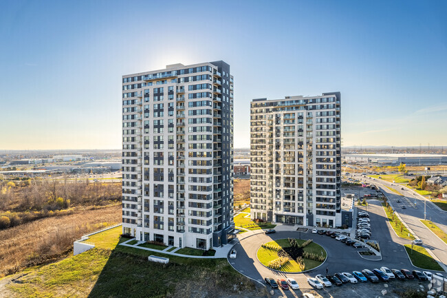 Building Photo - Équinoxe Saint-Elzéar