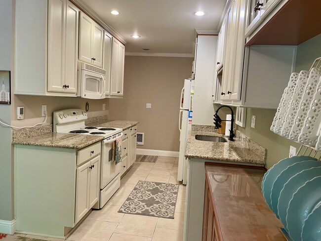 Heated Tile Kitchen Floor - 832 100th Ave NE