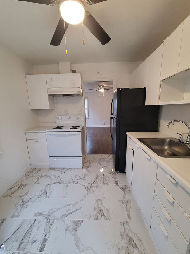 Building Photo - Three Bedroom Available Now!