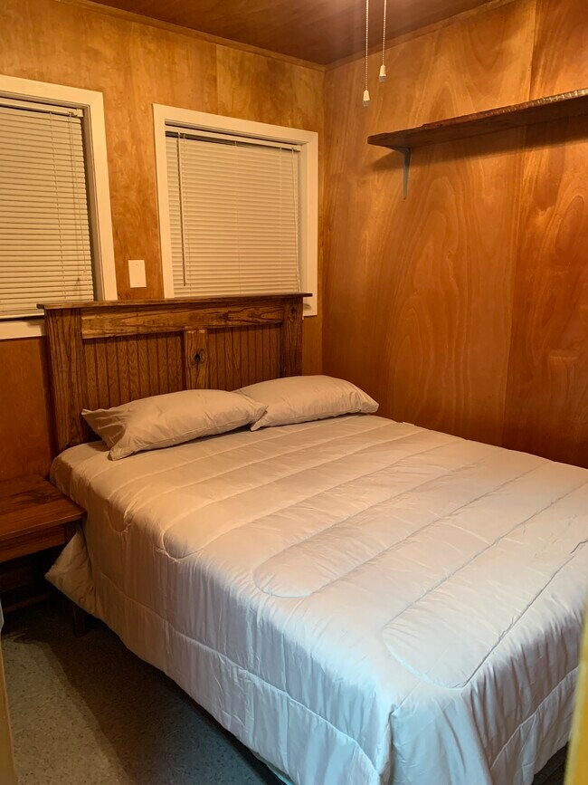 Smaller Bedroom 2. - 5843 N Highway 1
