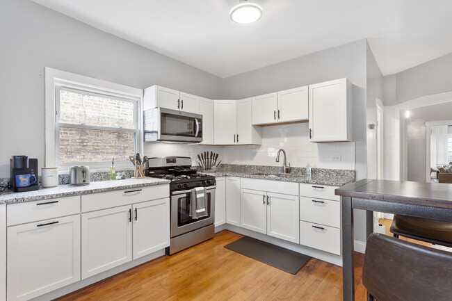 Fully stocked remodeled kitchen with new appliances - 3038 N Avers Ave