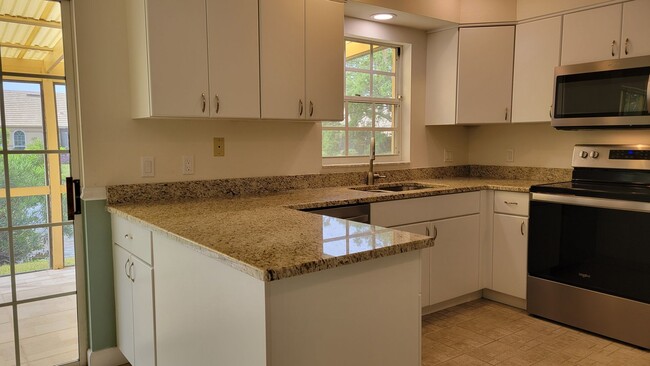 Building Photo - Annual UNfurnished renovated 2/2 villa in ...