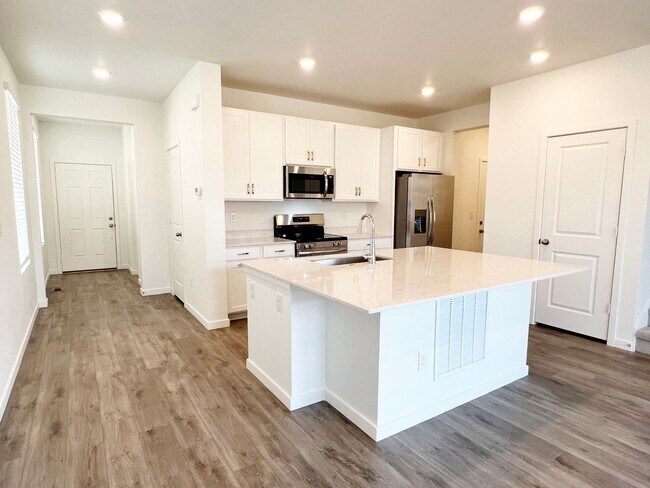 Building Photo - Brand New Home with a Fenced Yard and Cove...