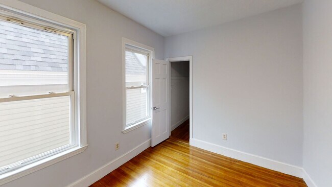 Building Photo - 9/1 No Fee! Renovated 3BR near Green Line w/balcony, free laundry