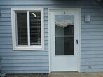 Front entry and assigned parking right in front of door. - 215 8th St SE