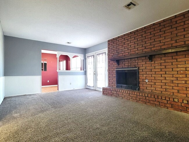 Building Photo - Welcome to the charming 3/2 home in the de...