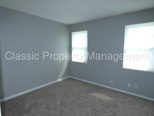 Building Photo - Great Location Townhome- 8037 N Harrison Lane