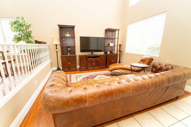 Building Photo - Expansive, Upgraded 4-Bedroom Home with Pr...