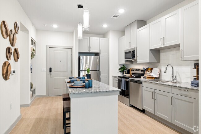 A1 1 dormitorio, 1 baño - 638 pies cuadrados - Área de cocina/comedor - Aspire at Greenville