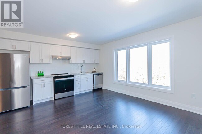 Photo du bâtiment - 37 Wild Rose Gardens