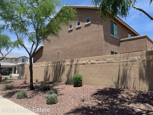 Building Photo - 4 br, 2.5 bath House - 6243 W Orchid Ln