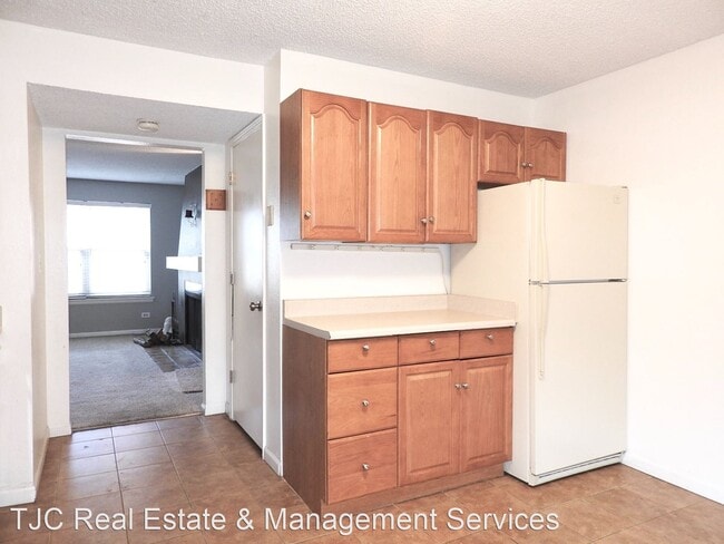 Building Photo - 3 br, 1.5 bath House - 9370 E Girard Avenu...