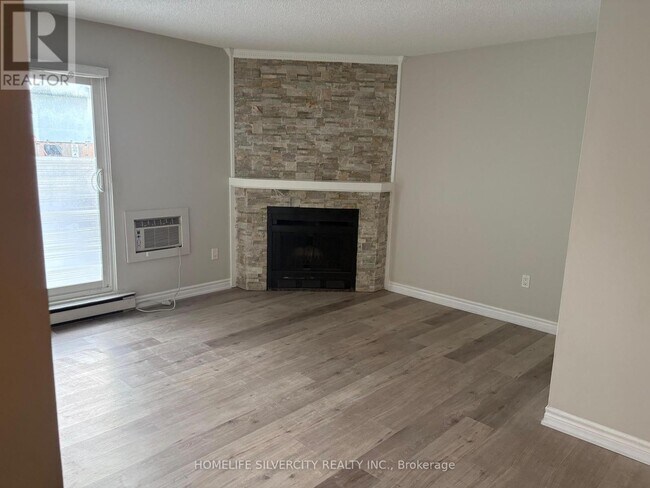 Photo du bâtiment - 1450 Glen Abbey Gate