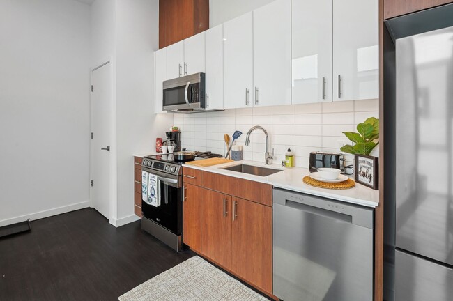 Building Photo - Modern 1-Bedroom with In-Unit Washer/Dryer...