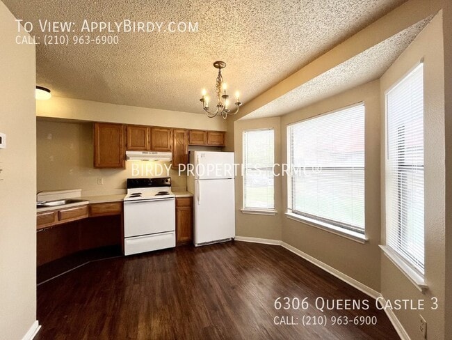 Building Photo - Charming 1-Bedroom Multiplex with Cozy Fir...