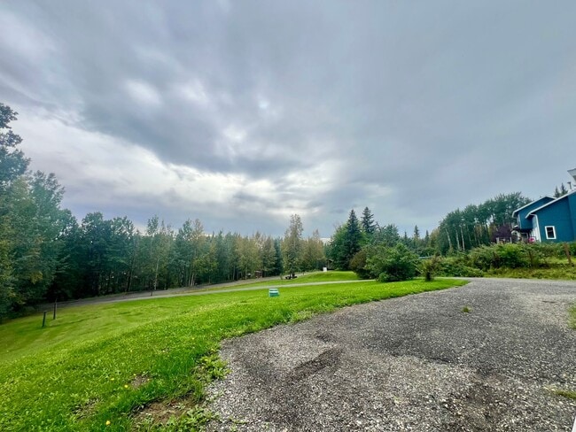 Building Photo - Spacious 3BR/2.5BA Fairbanks Home – Garage...