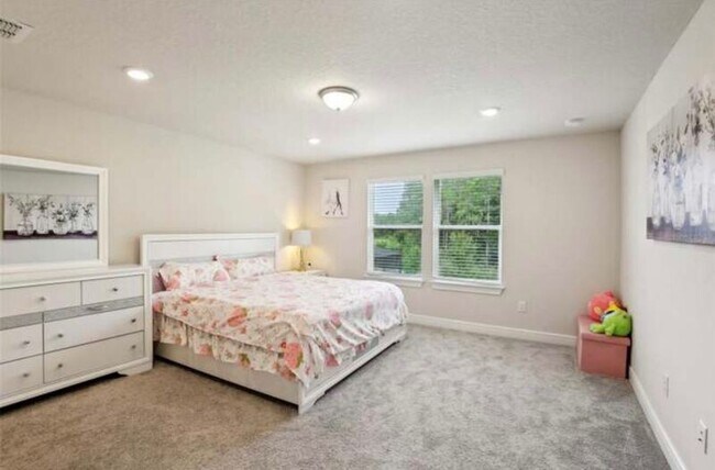 Foto del edificio - 10815 Windswept Garden Way