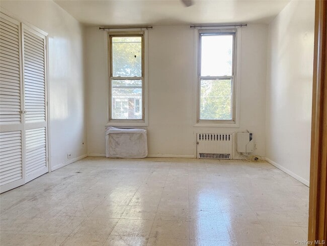 Building Photo - 74-51 64th Pl