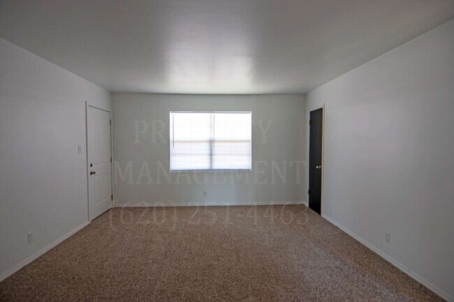 Foto del edificio - 403 W 9th St