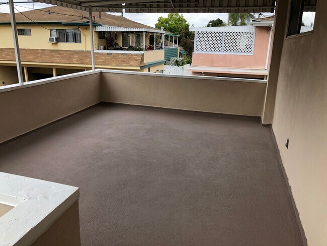 Upstairs patio - 6661 Rhodes Ave