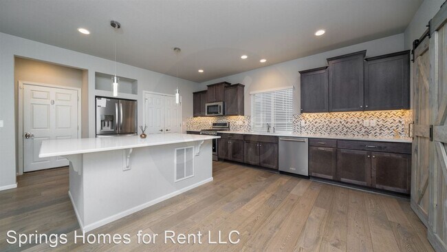 Foto del edificio - 5 br, 3.5 bath House - 6803 Backcountry Loop