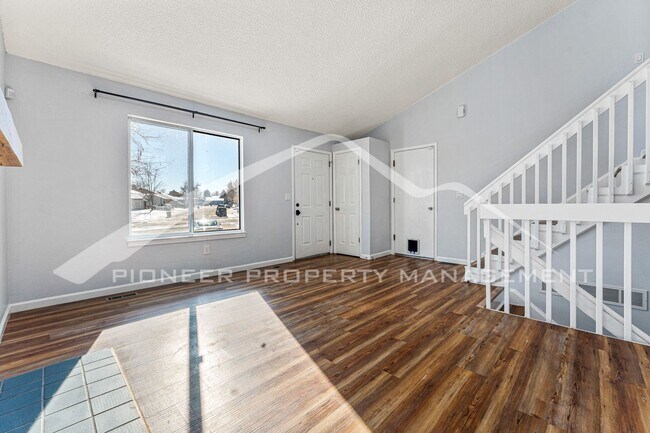 Building Photo - Beautiful Home with Fenced Back Yard and A...