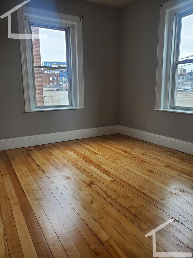 Building Photo - Central Allston Location. Steps from the T Stop. Heat, Hot Water Included, Laundry Facility. Eat-...