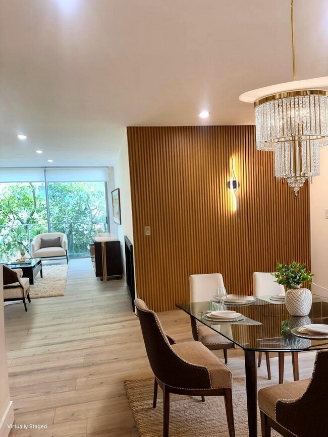 Parte de la sala de estar y el comedor recreada virtualmente. - 11645 Montana Ave