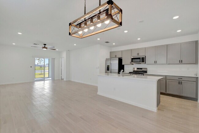 Building Photo - Luxurious Living: Spacious 5-Bedroom Home with Scenic Views in Port Saint Lucie!