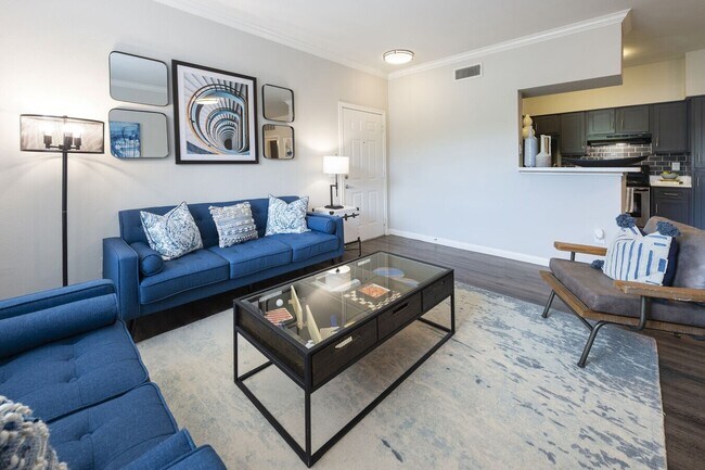 Building Photo - Live Large, Save Larger