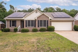 Building Photo - 402 Roundtree Dr