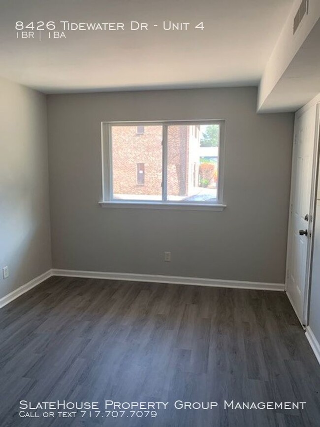 Building Photo - 8426 Tidewater Dr