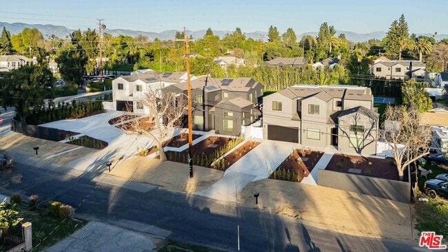 Building Photo - 8670 Encino Ave