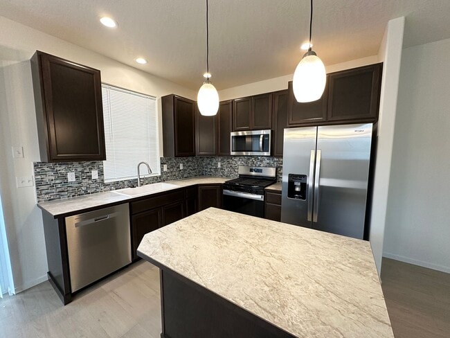 Building Photo - Brand New Post Falls Duplex