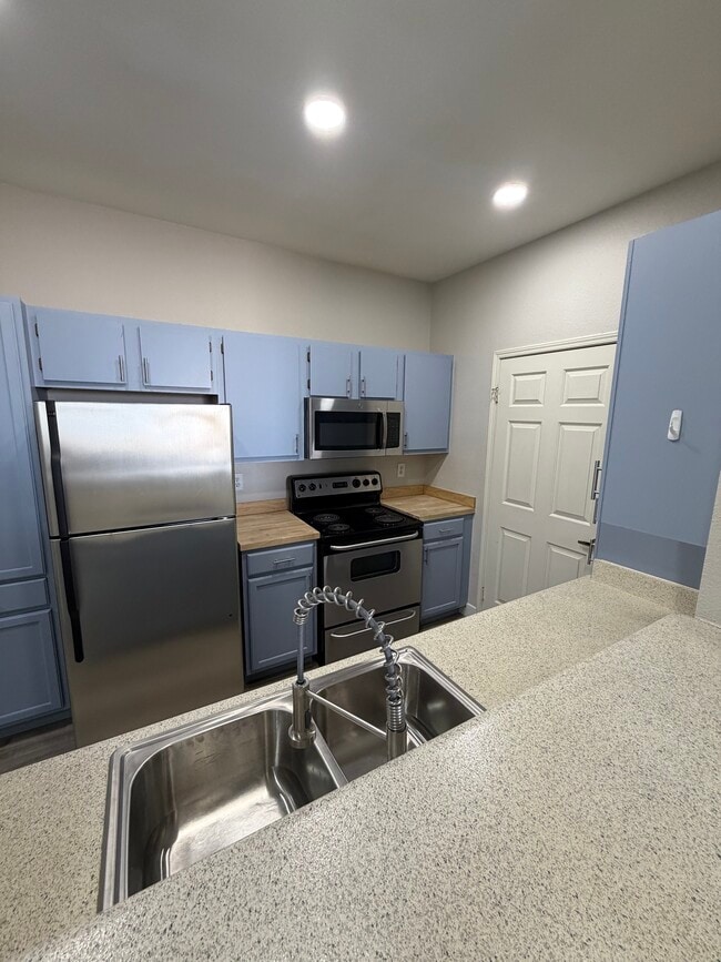 Kitchen.  new sink and faucet and disposal,additioal pantry added - 231 W Horizon Ridge Pky
