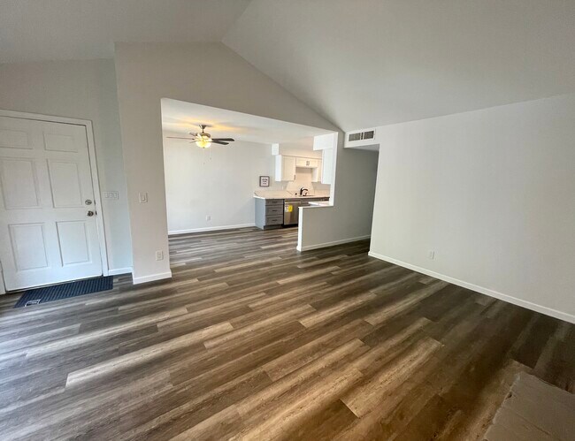 Living room looking into dining - 6330 N Fresno St